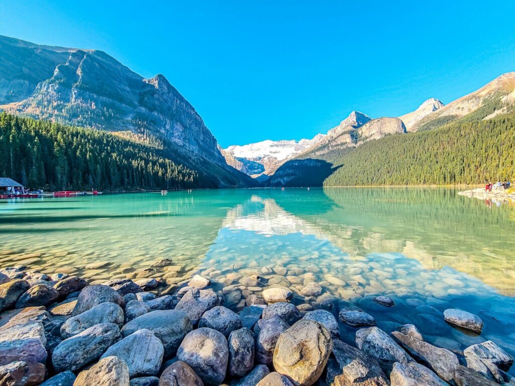 Turquoise waters of Lake Louise beneath Victoria Glacier