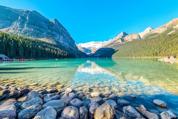 Turquoise waters of Lake Louise beneath Victoria Glacier