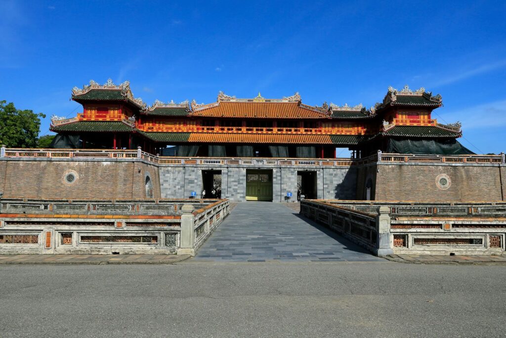 Majestic entrance to Hue's Imperial City, showcasing traditional architecture and vibrant colors.