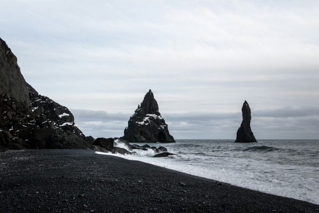 The Reynisdrangar sea stacks off the black sand beach of Reynisfjara