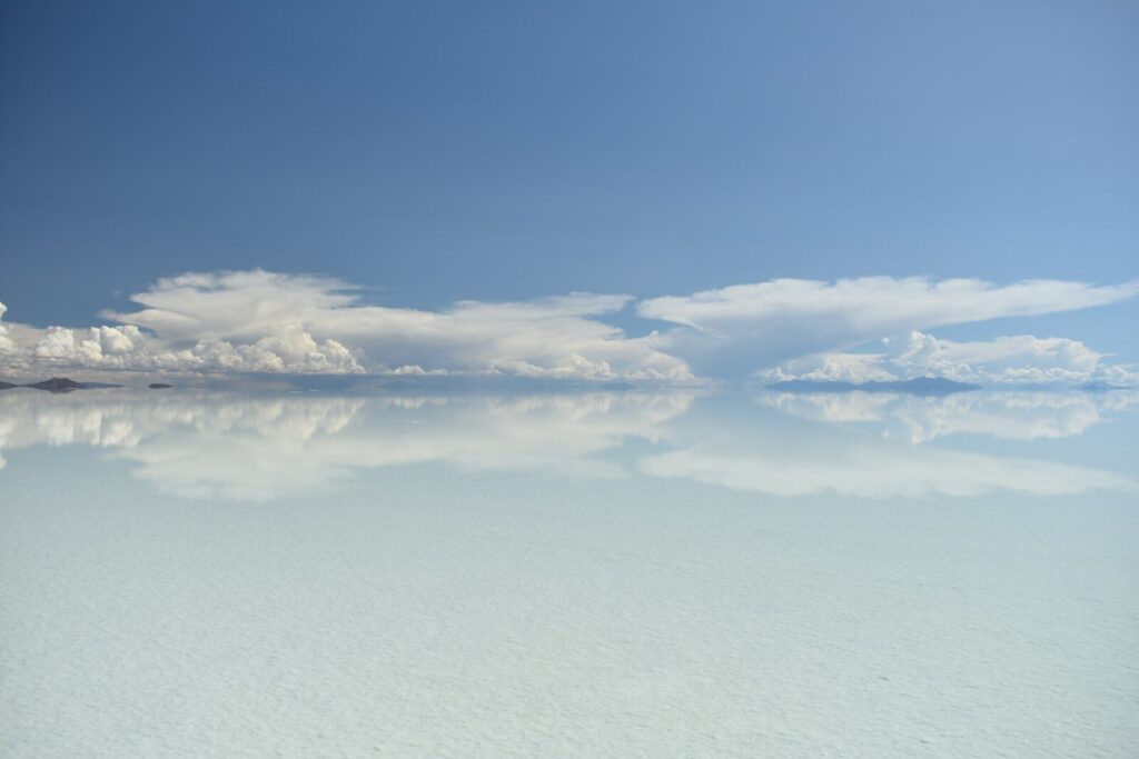 Salar de Uyuni salt flat mirroring the sky and clouds after rain